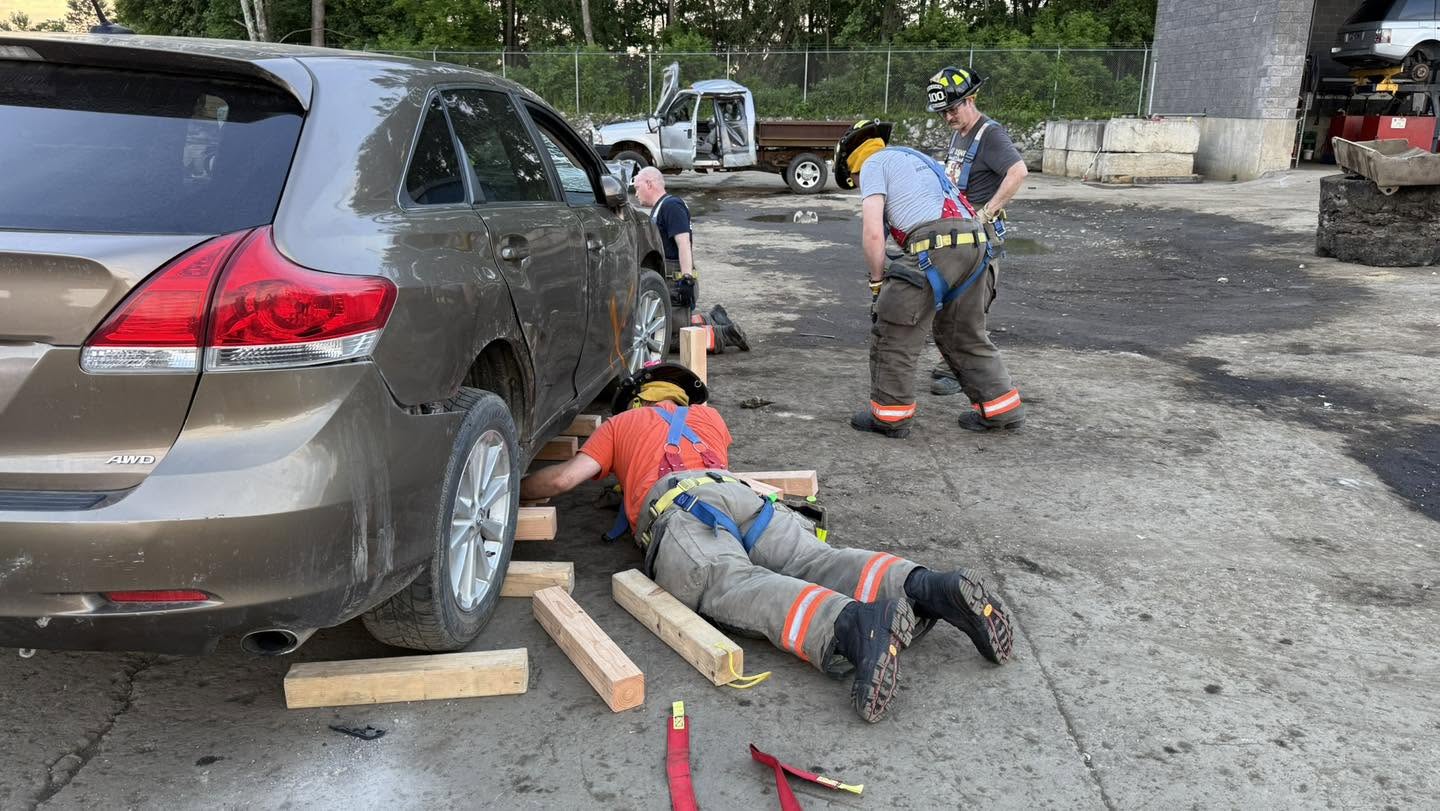 Apalachin firefighters practicing vehicle stabilization with cribbing